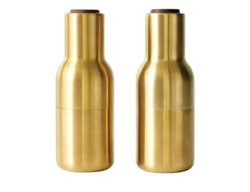 Pair of brass Audo Bottle Grinders with gold bottle-shaped bodies and brown wooden lids