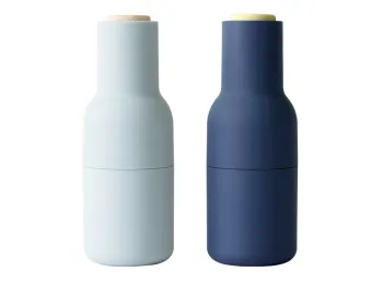 Classic blue Audo Bottle Grinder set with pale blue and navy bodies topped by light wooden lids